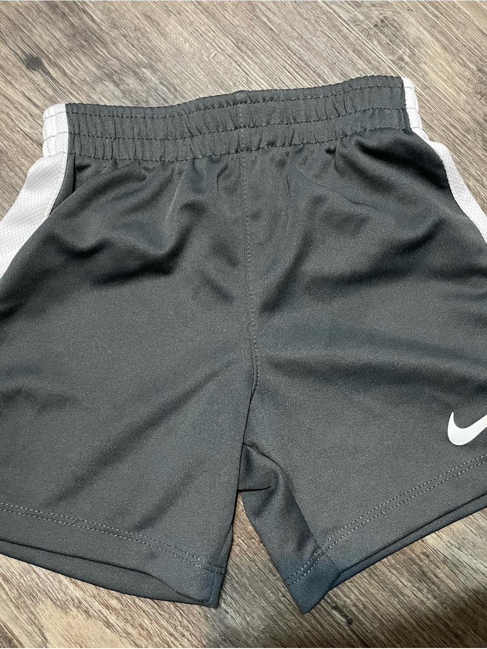 Nike Black Kids Athletic Shorts with White Swoosh and Side Panels 24M